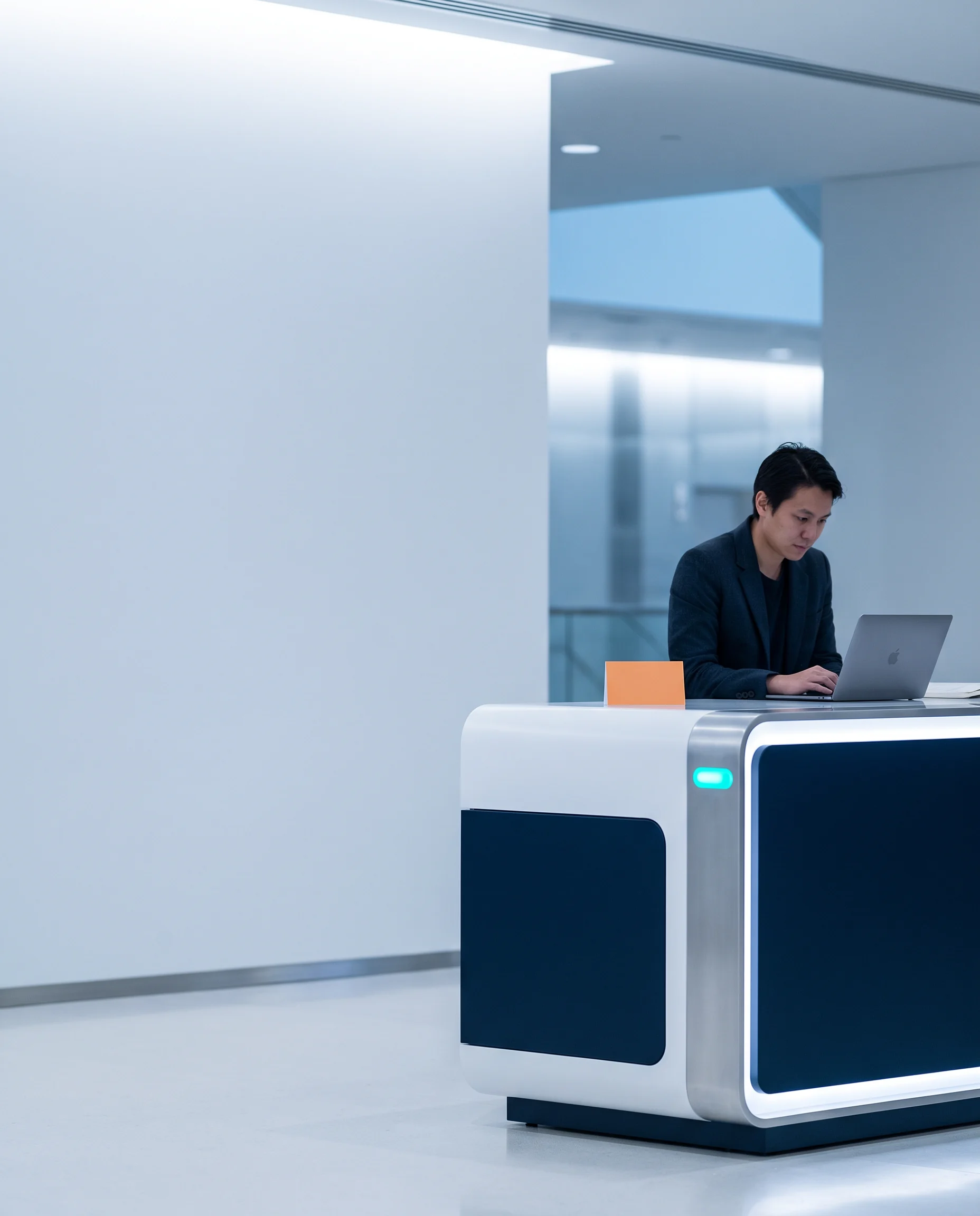 A focused learner working at an illuminated launch console
